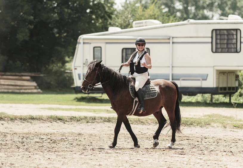 Horseback rider passing RV